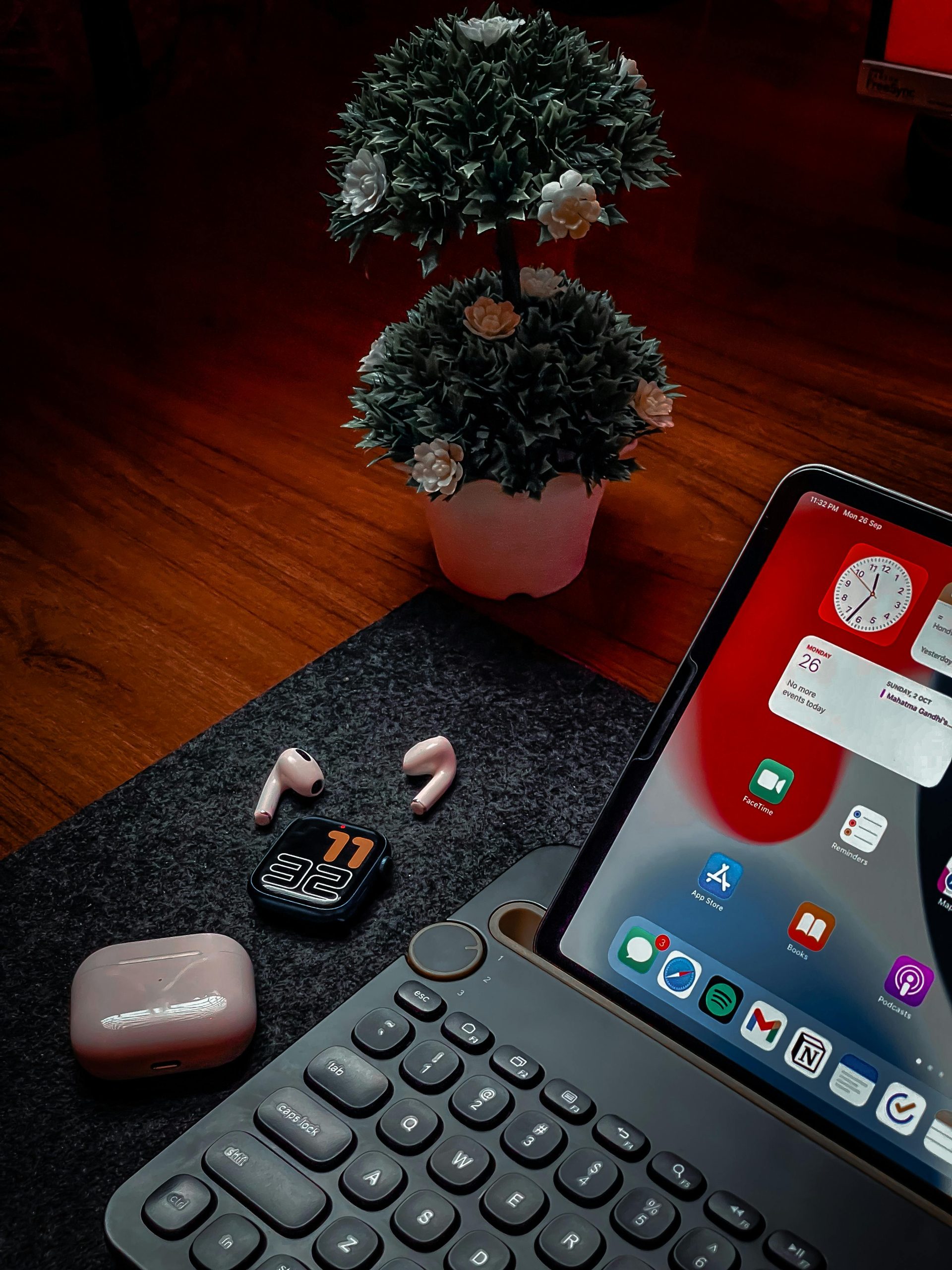 a tablet and earphones on a desk